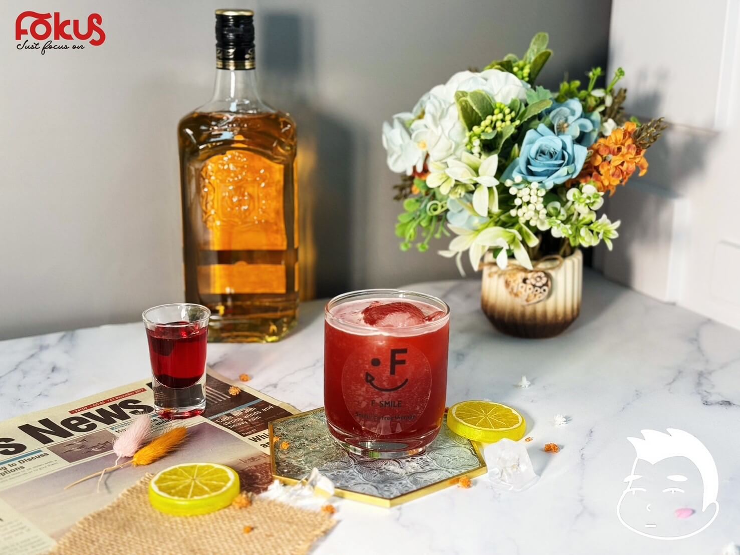 Pomgranate Whiskey Coffee with Americano, whiskey, lemon syrup, and pomegranate syrup